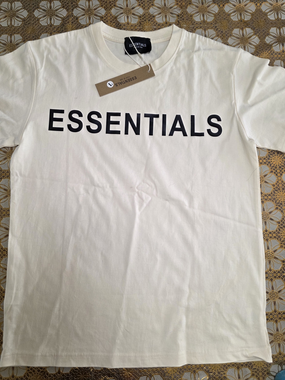 ESSENTIALS Men’s Cream Logo T-Shirt